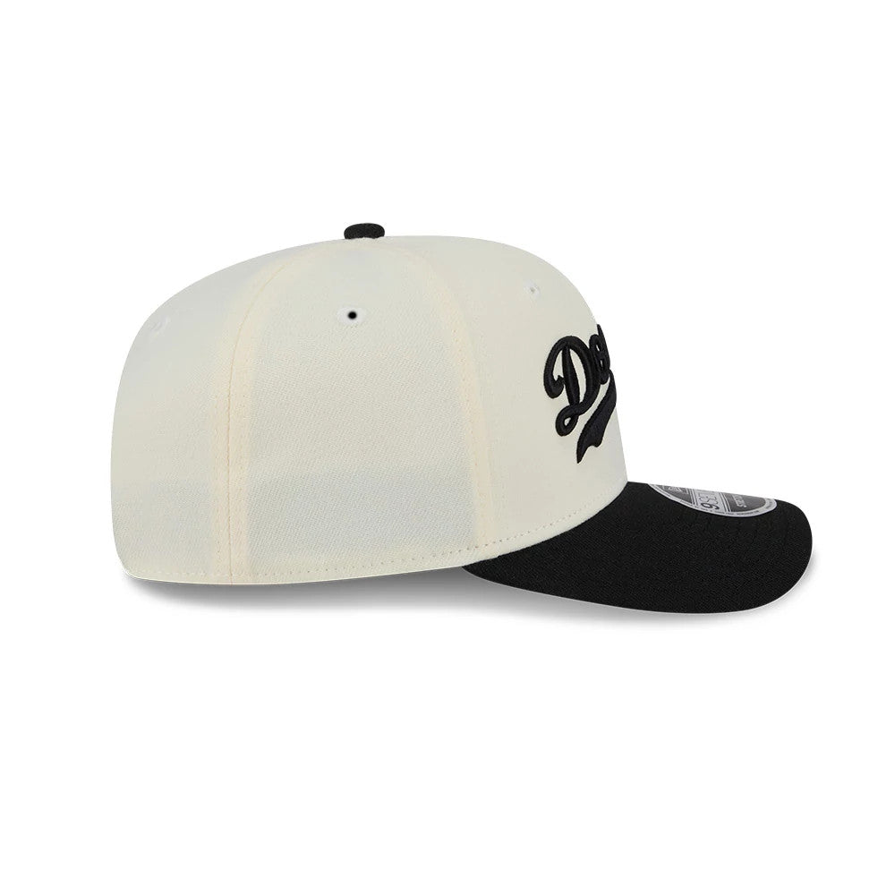 Pictured is this MLB 2 Tone LA Dodgers 9SEVENTY Stretch Snap cap in cream & black. 8