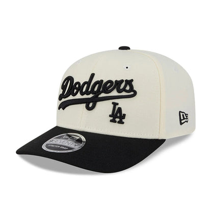 Pictured is this MLB 2 Tone LA Dodgers 9SEVENTY Stretch Snap cap in cream & black. 1