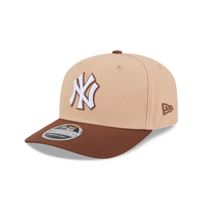 Pictured is this MLB Candied Pecan New York Yankees 9SEVENTY Stretch Snap cap in beige. 1