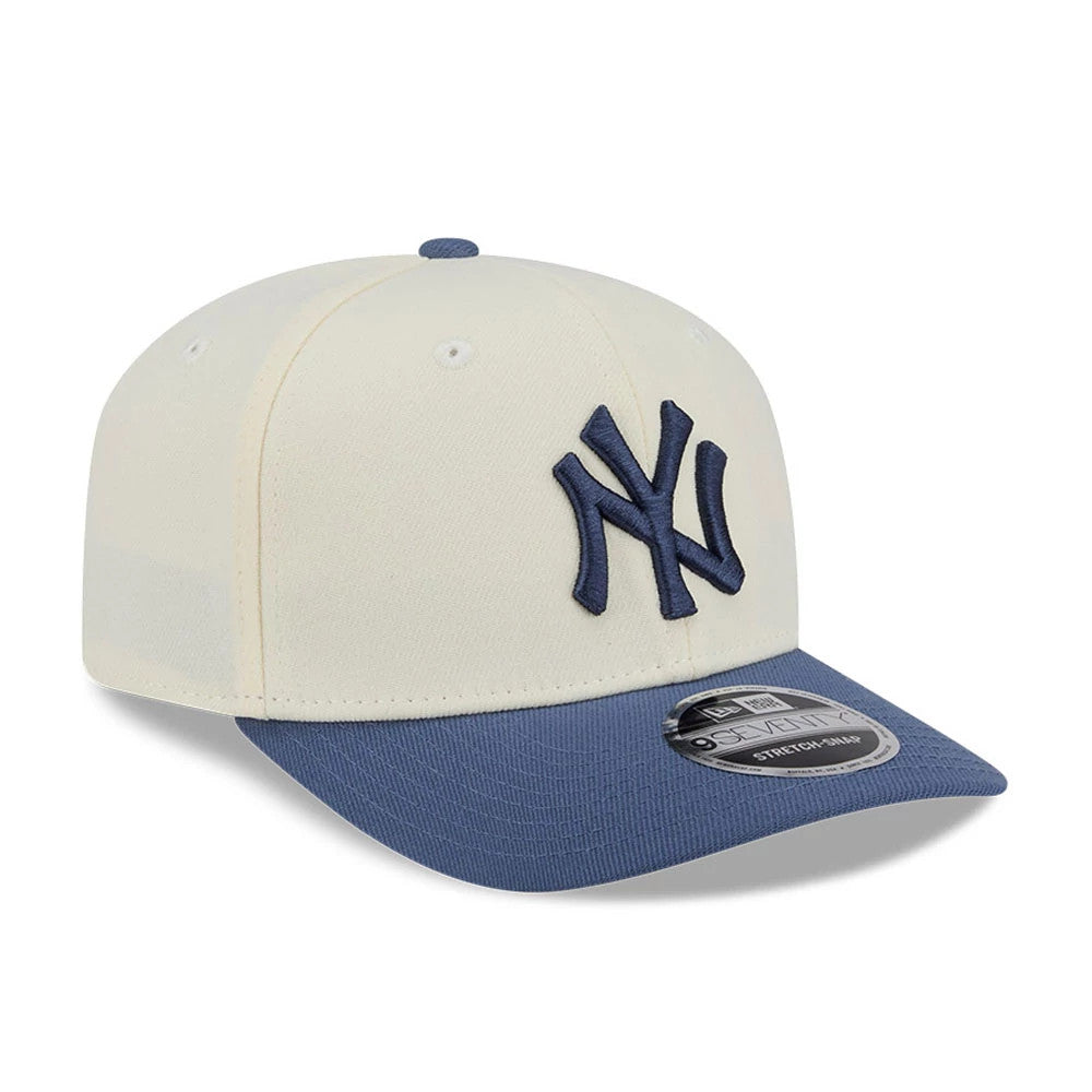 Pictured is this MLB Slate Stone New York Yankees 9SEVENTY Stretch Snap cap in cream & dark blue. 4