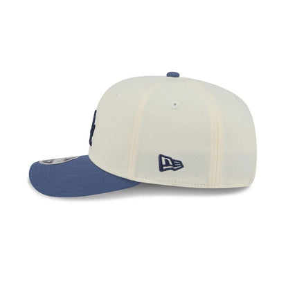Pictured is this MLB Slate Stone LA Dodgers 9SEVENTY Stretch Snap cap in cream & dark blue. 5