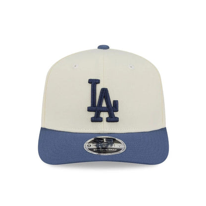 Pictured is this MLB Slate Stone LA Dodgers 9SEVENTY Stretch Snap cap in cream & dark blue. 3