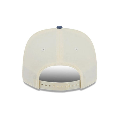 Pictured is this MLB Slate Stone LA Dodgers 9SEVENTY Stretch Snap cap in cream & dark blue. 7
