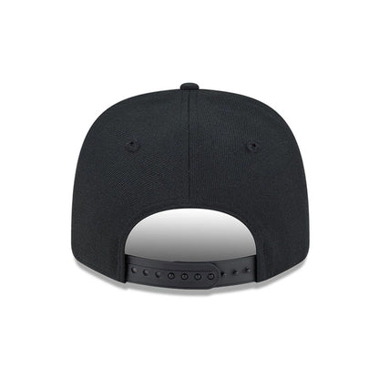 Chicago White Sox MLB Black New Era 9SEVENTY Stretch Snap Adjustable Cap, rear view showing a black snap closure at the lower edge of the structured black crown, complemented by eyelets and a top button for a finish.