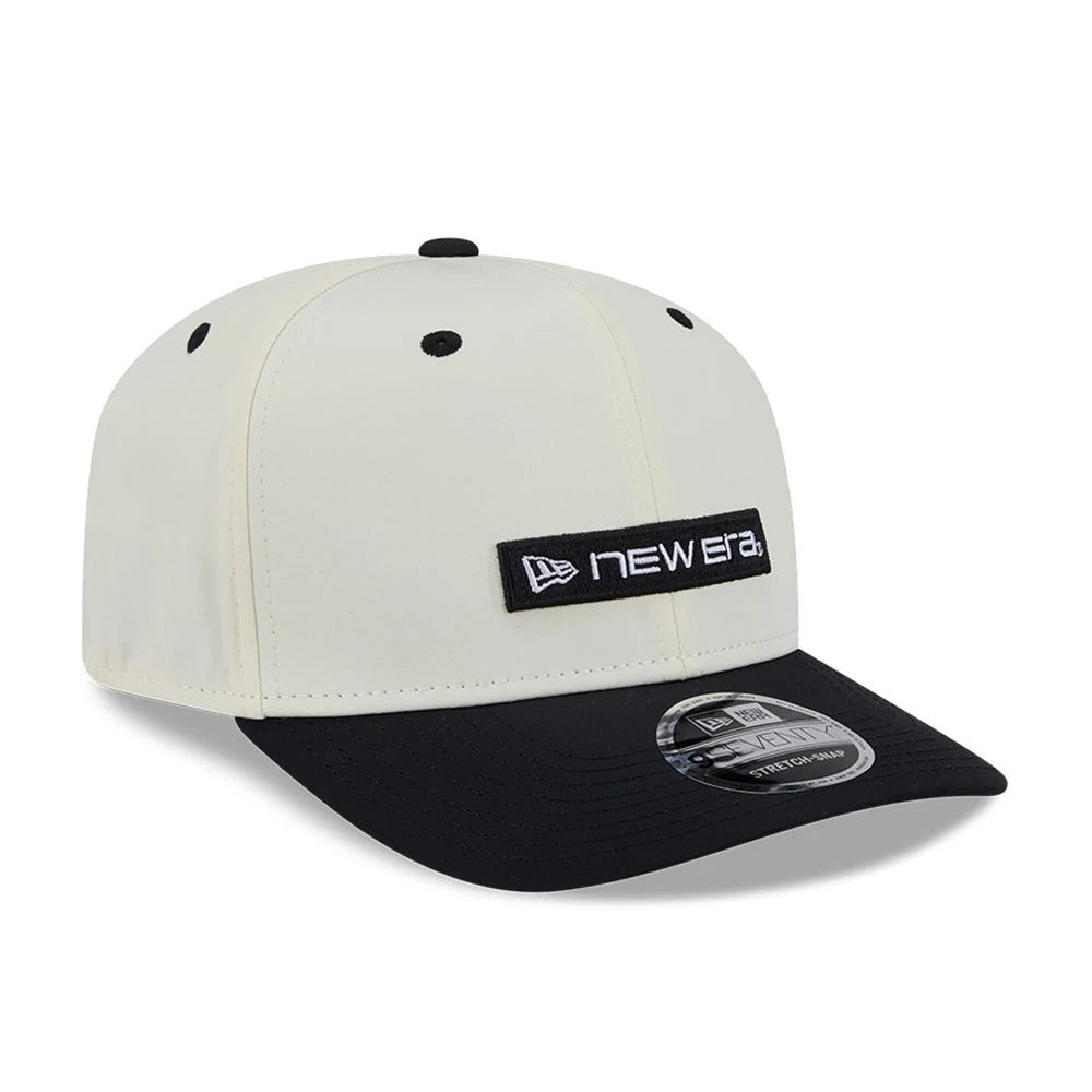 Pictured is this New Era Linear Logo 9SEVENTY Stretch Snap cap in white. 4