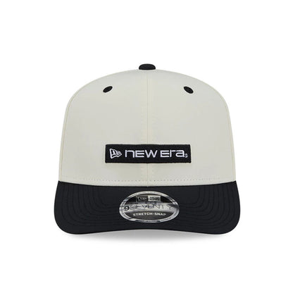 Pictured is this New Era Linear Logo 9SEVENTY Stretch Snap cap in white. 3