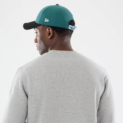 The model is wearing this NFL Training 2026 Philadelphia Eagles Crew Neck Sweater in grey. 5