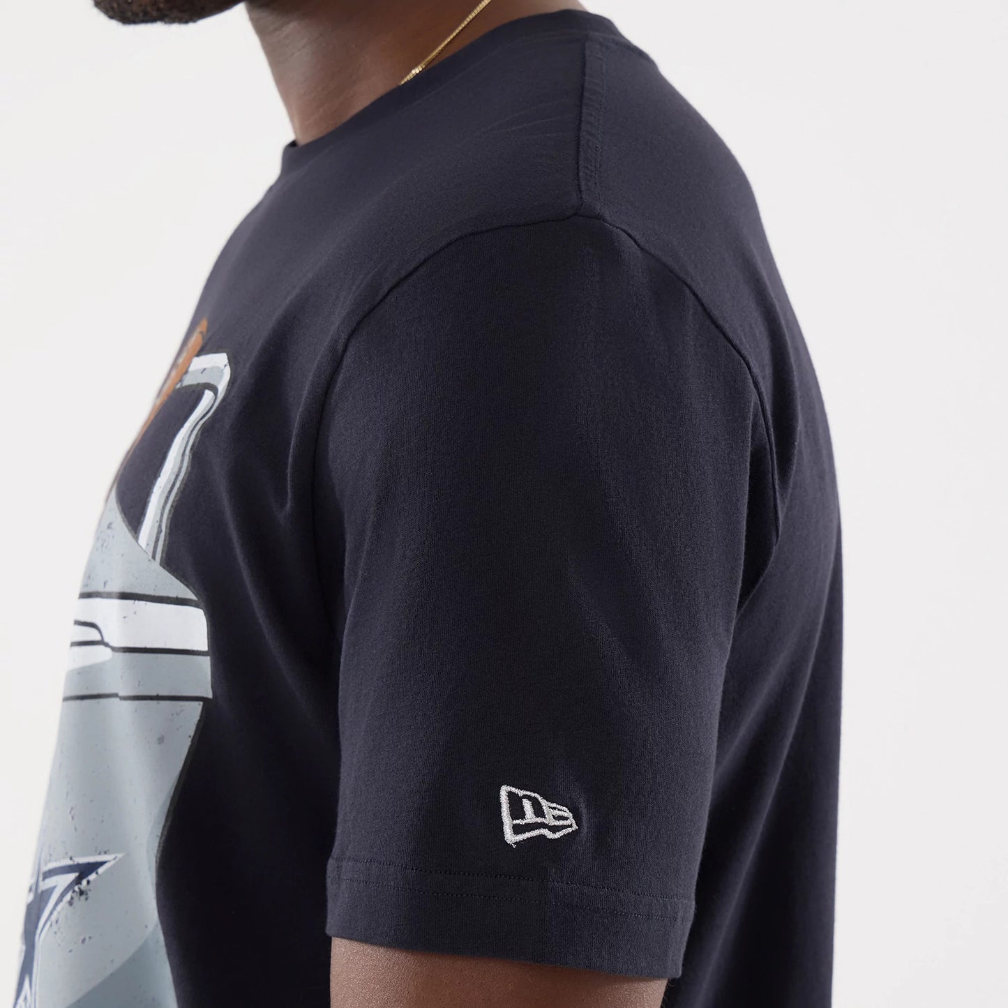 The model is wearing this NFL Training 2026 Dallas Cowboys T-Shirt in navy. 5
