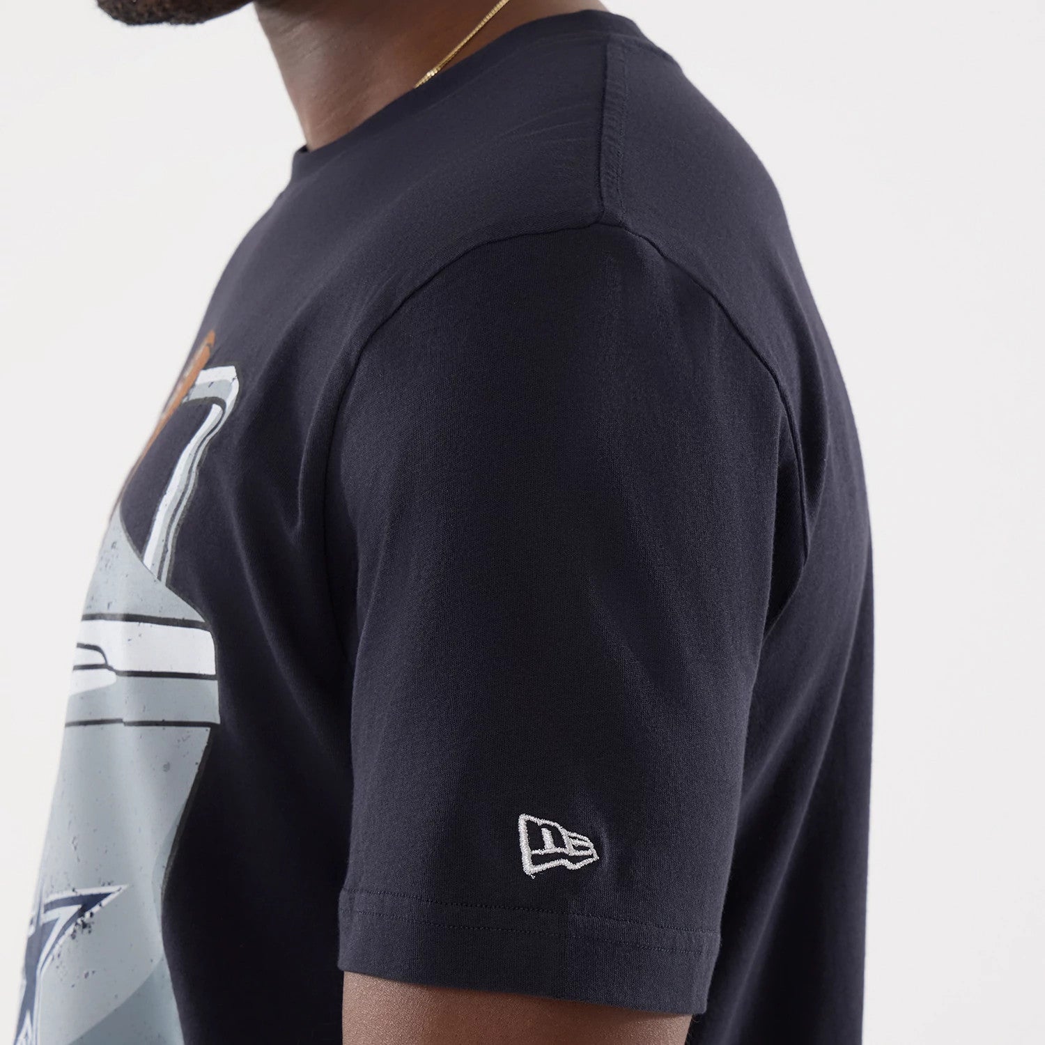 The model is wearing this NFL Training 2026 Dallas Cowboys T-Shirt in navy. 5