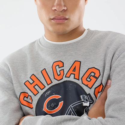 The model is wearing this NFL Training 2026 Chicago Bears Crew Neck Sweater in grey. 6
