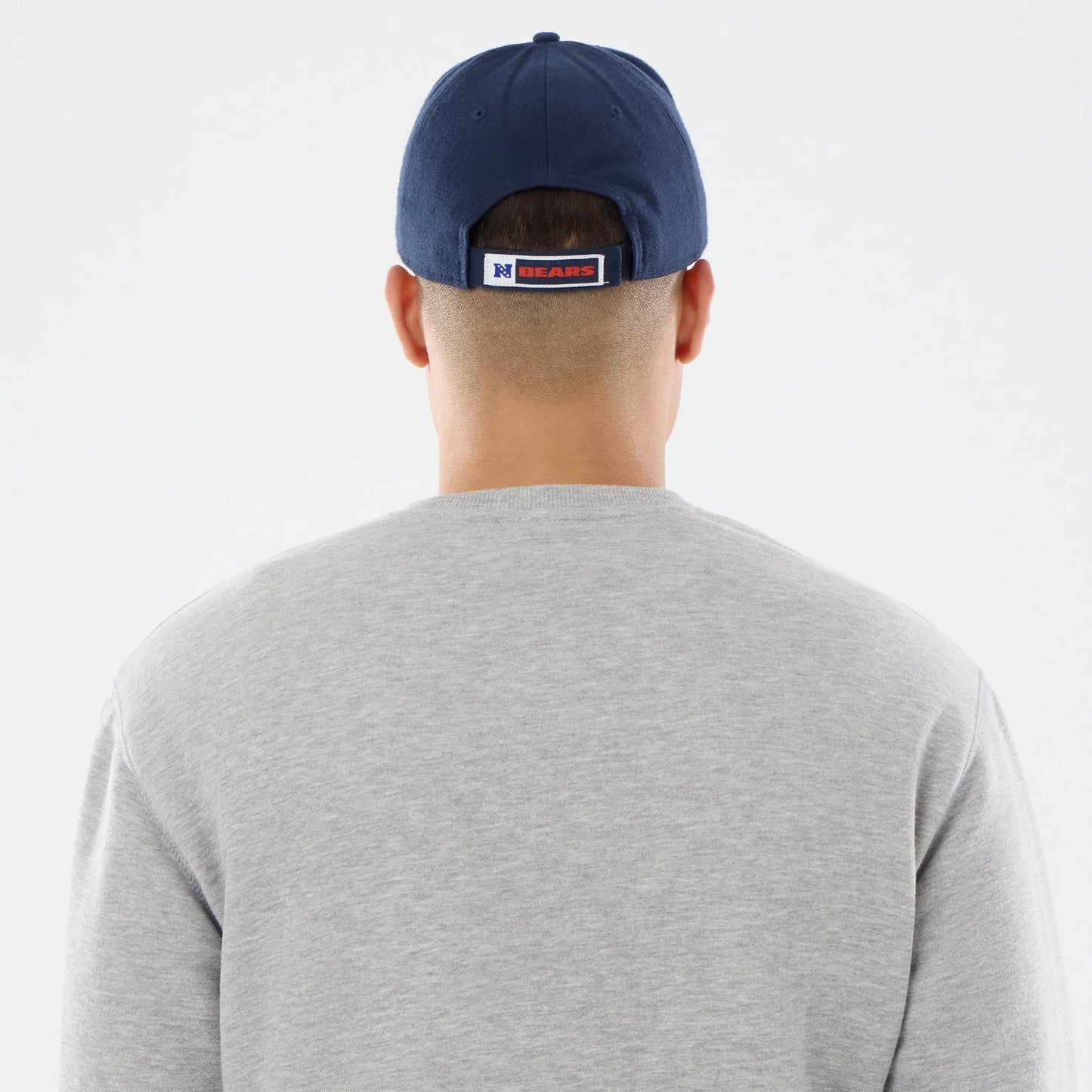The model is wearing this NFL Training 2026 Chicago Bears Crew Neck Sweater in grey. 7