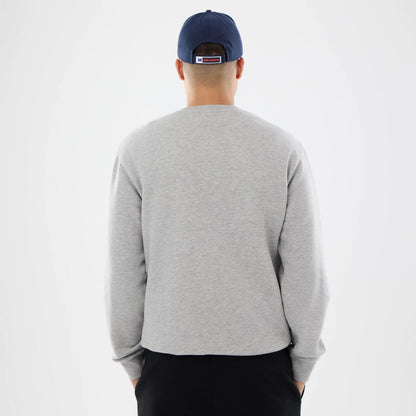 The model is wearing this NFL Training 2026 Chicago Bears Crew Neck Sweater in grey. 2