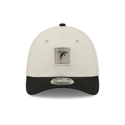 Pictured is this NFL Training 2026 Atlanta Falcons 39THIRTY M-Crown Stretch Fit cap in white. 2