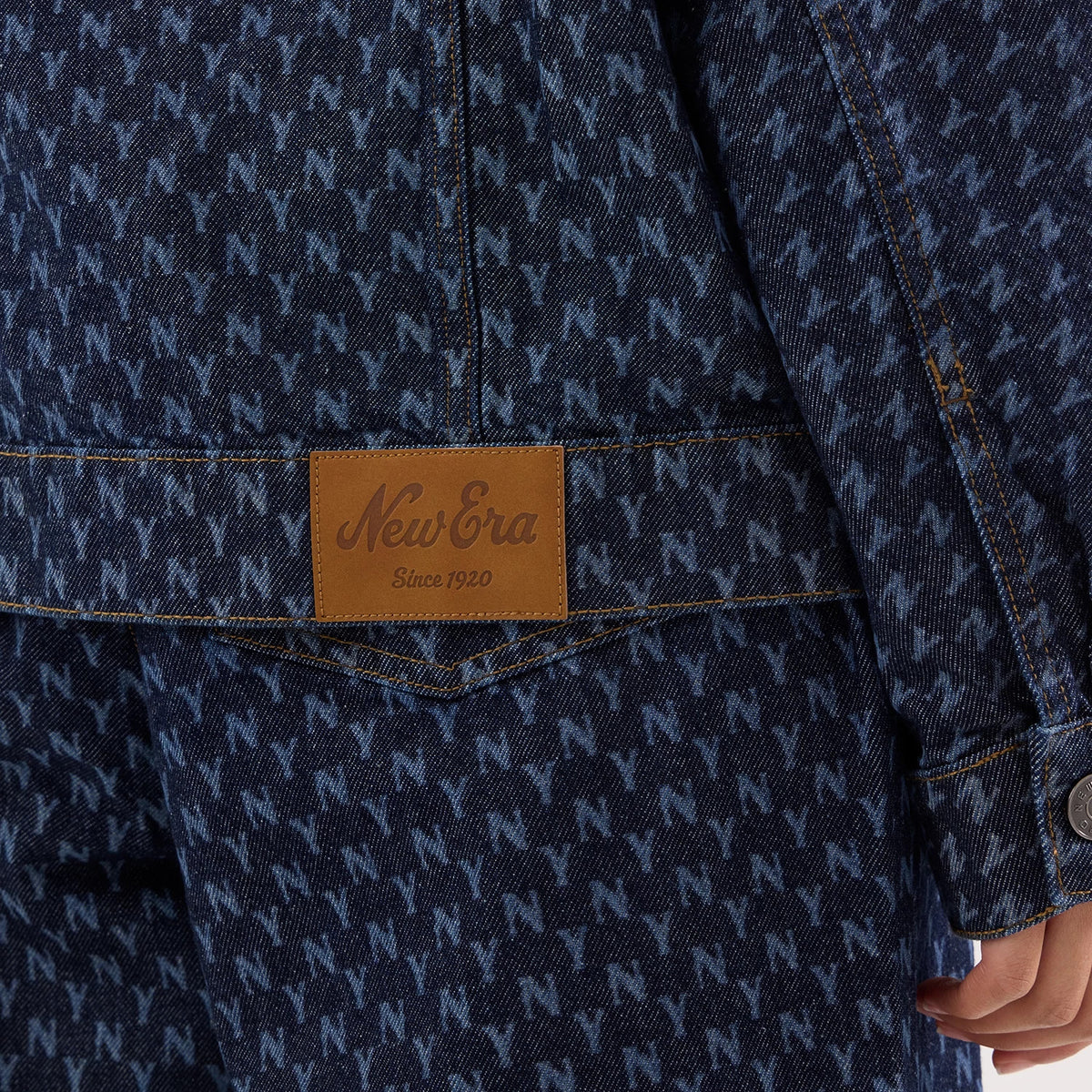 The model is wearing this Womens MLB Denim New York Yankees Jacket in navy. 4