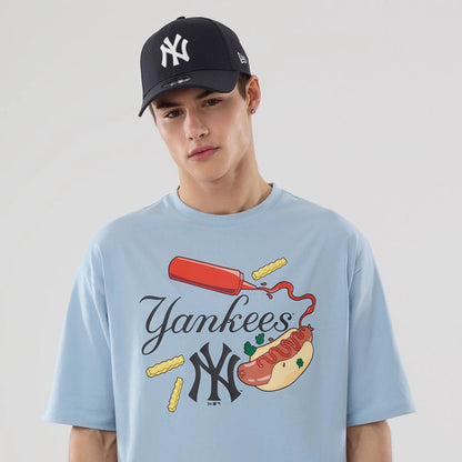 The model is wearing this MLB Food Graphic New York Yankees Oversized T-Shirt in pastel blue. 6
