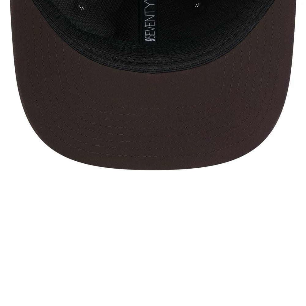 Pictured is this NFL Sideline 2026 Cleveland Browns 9SEVENTY Stretch Snap cap in dark brown. 7