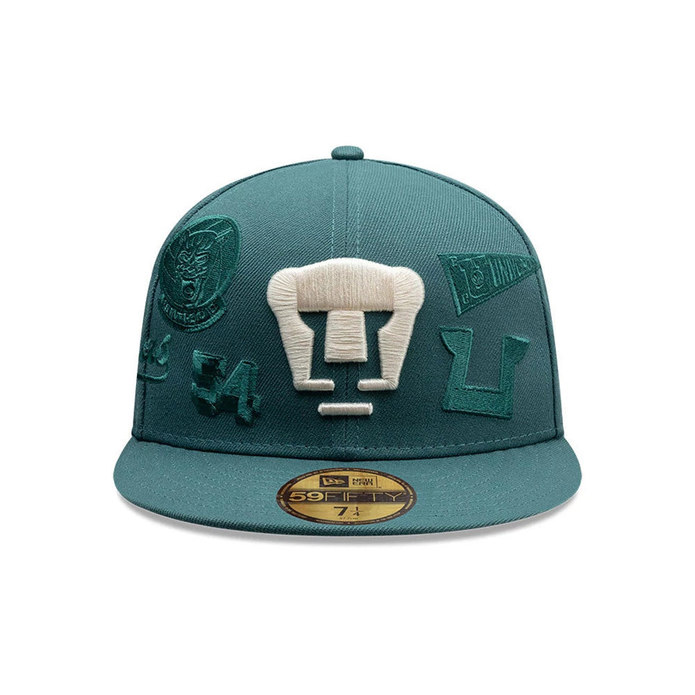 Pictured is this Liga MX All Over Pumas Unam 59FIFTY Fitted cap in dark green. 2