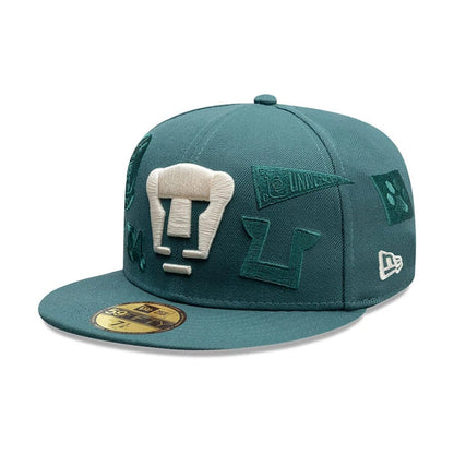 Pictured is this Liga MX All Over Pumas Unam 59FIFTY Fitted cap in dark green. 1