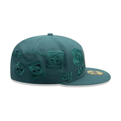 Pictured is this Liga MX All Over Cruz Azul 59FIFTY Fitted cap in dark green. 6