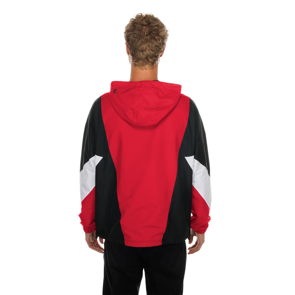 The model is wearing this NFL Kansas City Chiefs Windbreaker Jacket in red. 2
