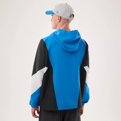 The model is wearing this NFL Detroit Lions Jacket in blue. 2