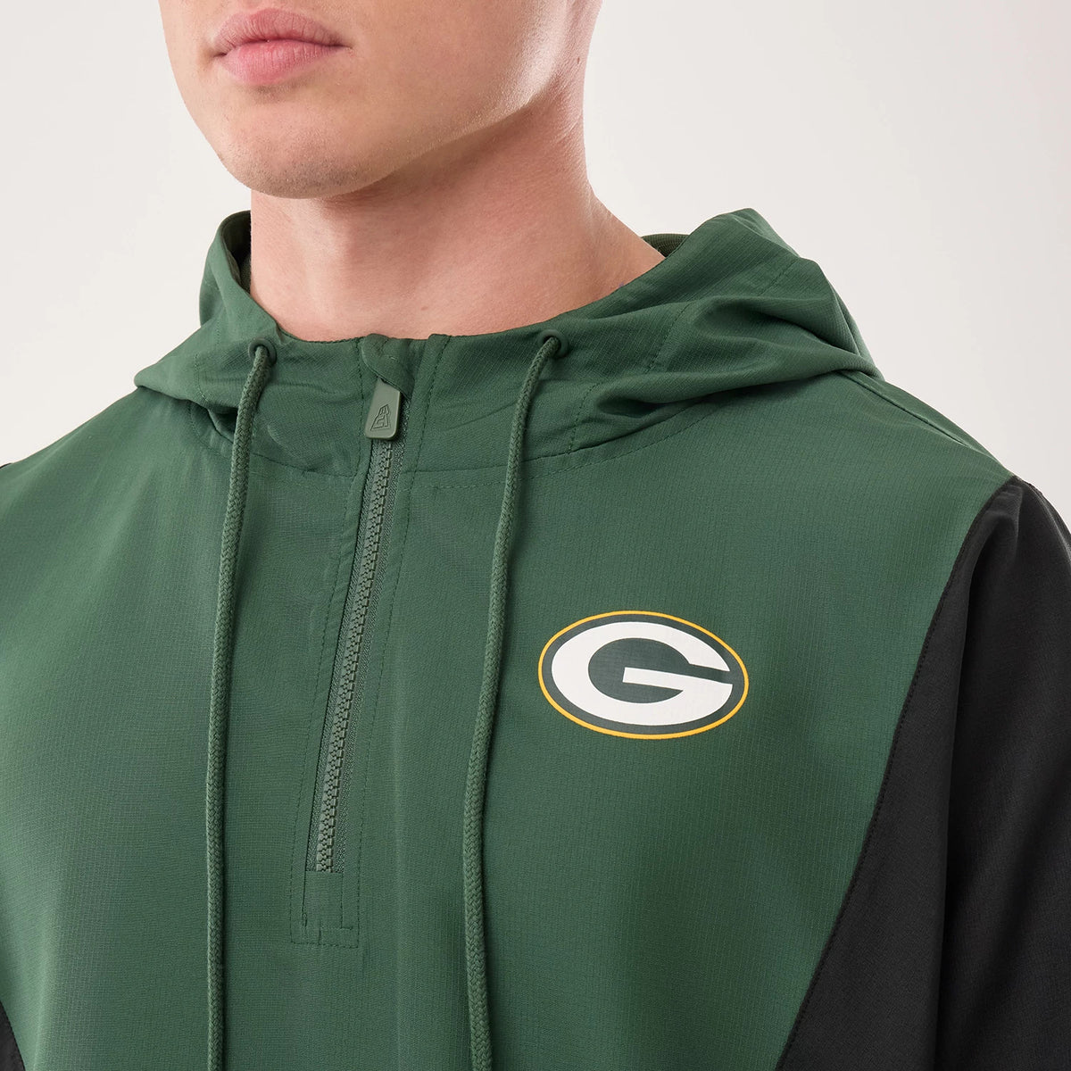 The model is wearing this NFL Green Bay Packers Jacket in dark green. 4