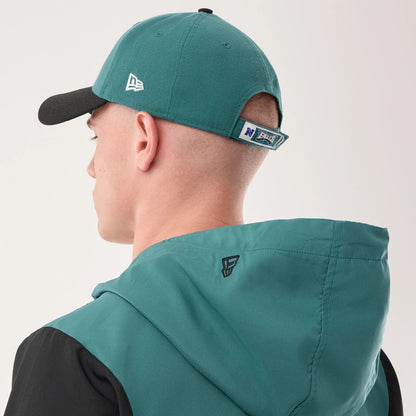 The model is wearing this NFL Philadelphia Eagles Jacket in dark green. 7