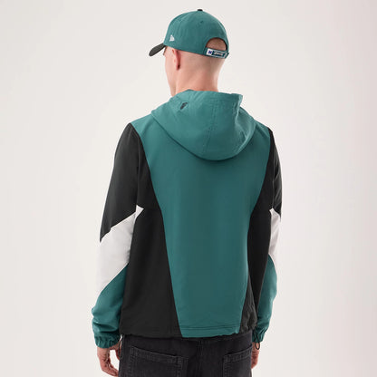 The model is wearing this NFL Philadelphia Eagles Jacket in dark green. 2