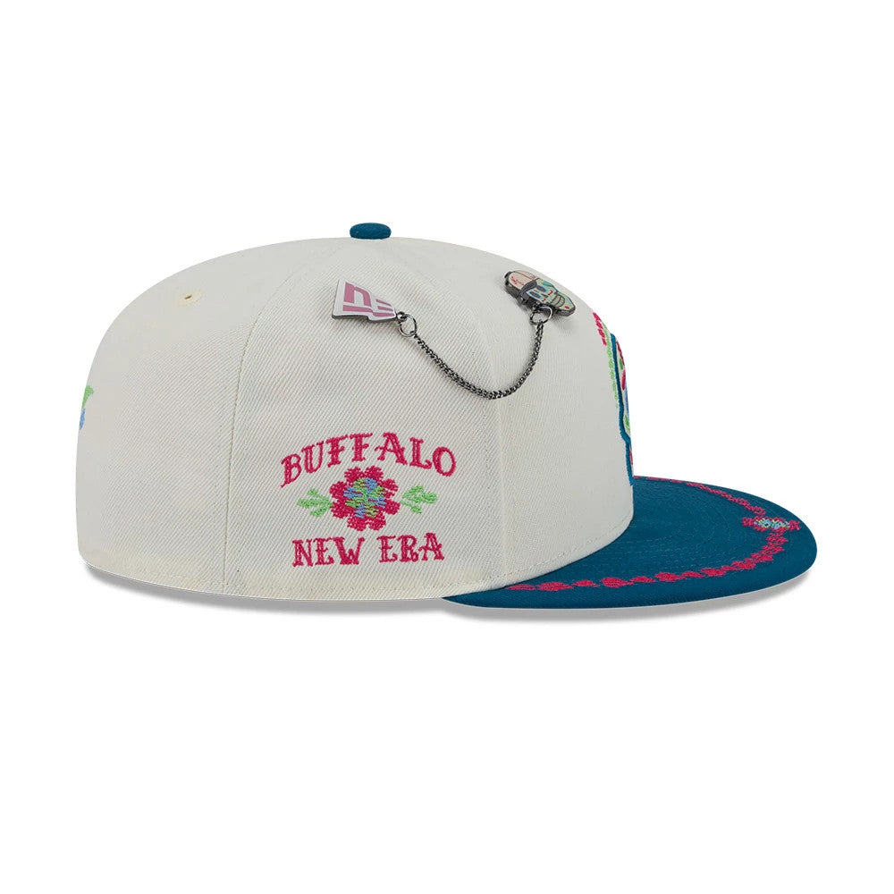 Pictured is this New Era Day Of The Dead 59FIFTY Fitted cap in light beige & blue. 5