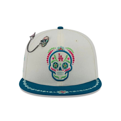 Pictured is this MLB Day Of The Dead LA Dodgers 59FIFTY Fitted cap in light beige & blue. 3
