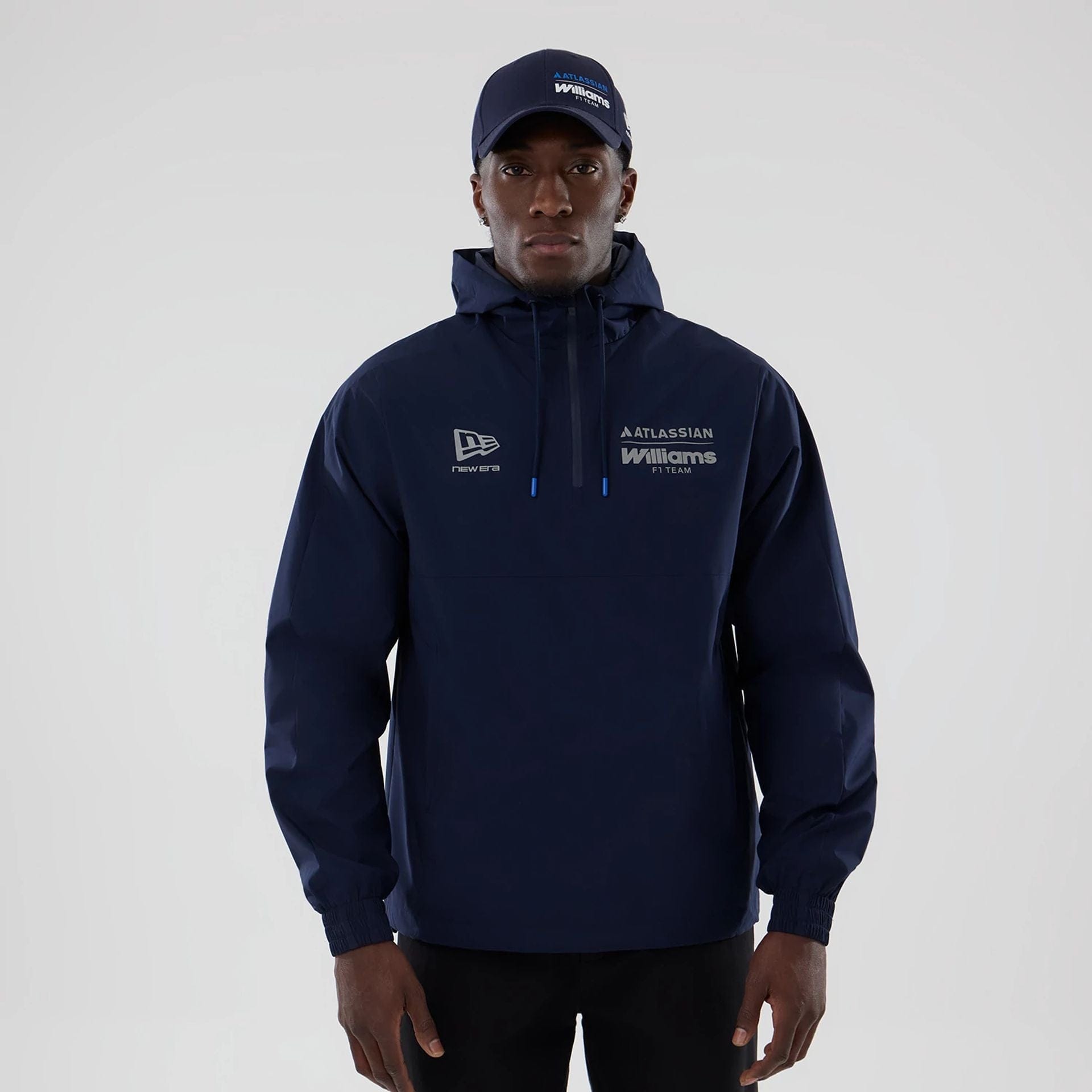 The model is wearing this Atlassian Williams F1 Team Windbreaker Jacket in navy. 1