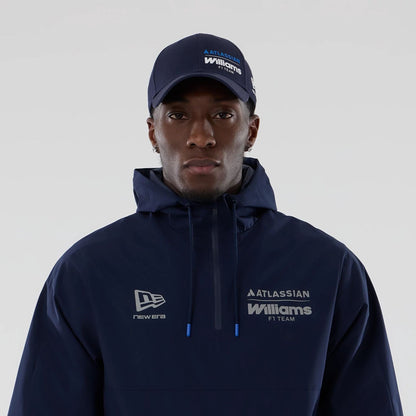 The model is wearing this Atlassian Williams F1 Team Windbreaker Jacket in navy. 3