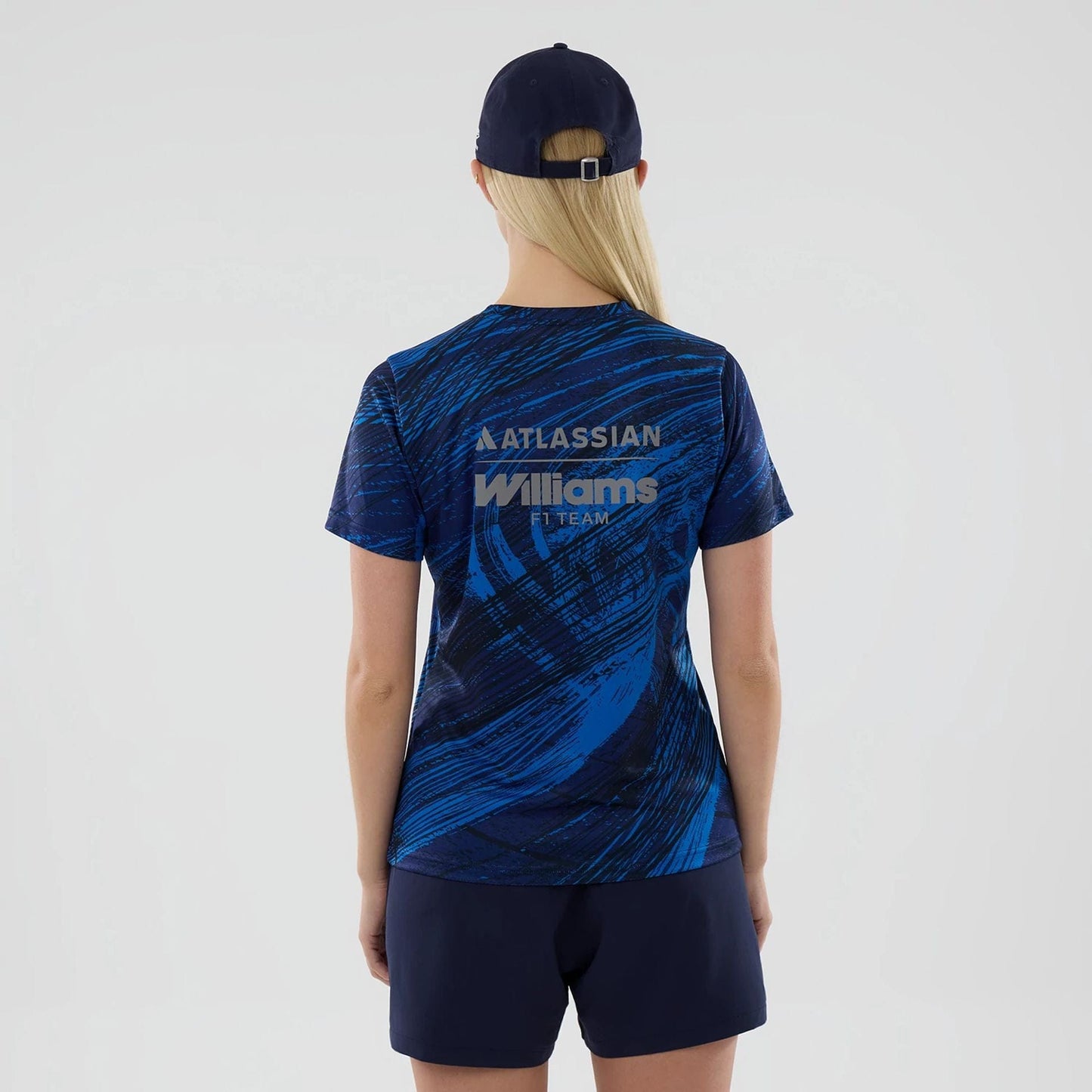 The model is wearing this Womens Atlassian Williams F1 Team Active T-Shirt in navy. 2