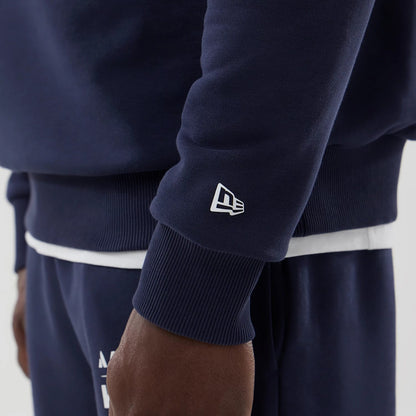 The model is wearing this Atlassian Williams F1 Team Oversized Crew Neck Sweater in navy. 5