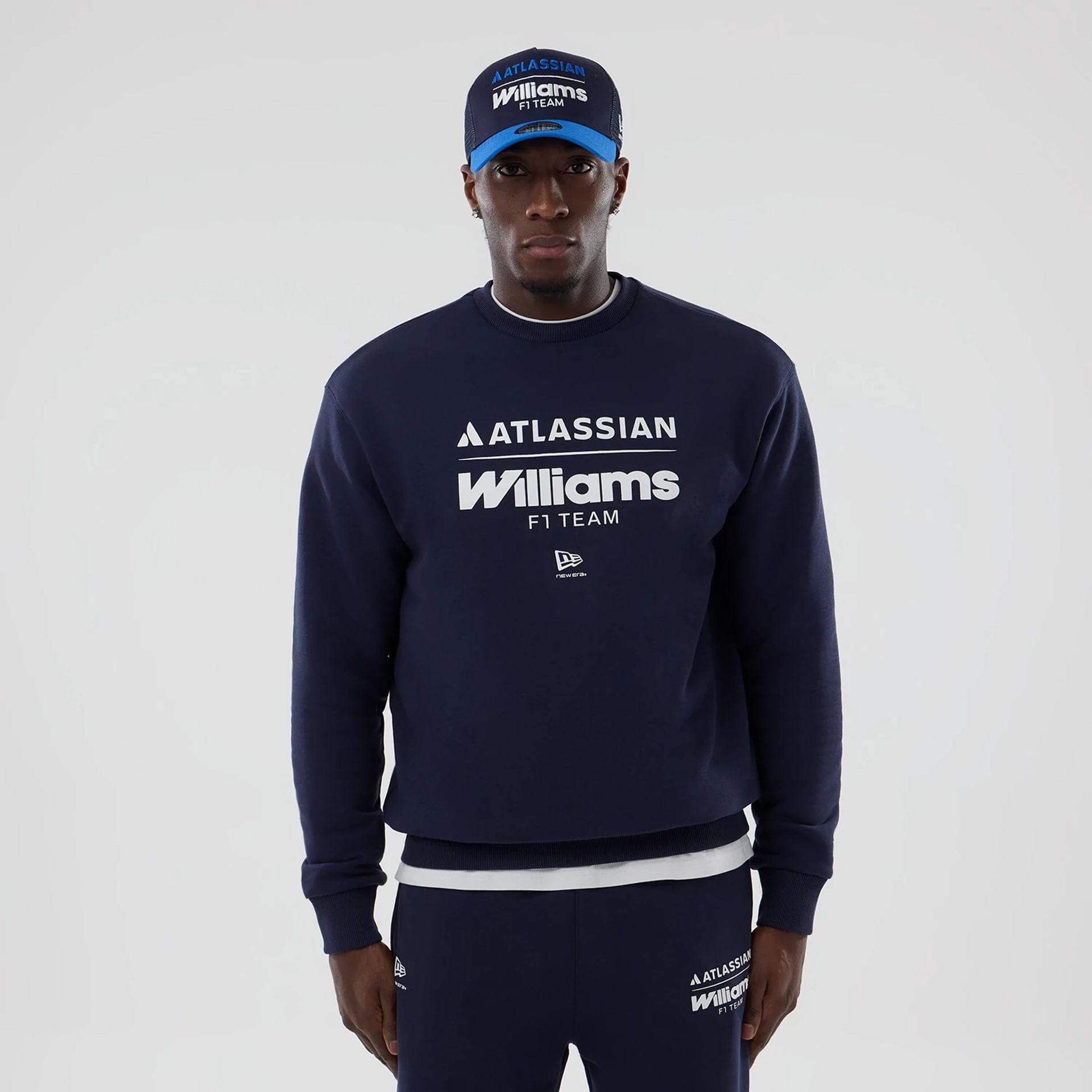 The model is wearing this Atlassian Williams F1 Team Oversized Crew Neck Sweater in navy. 1