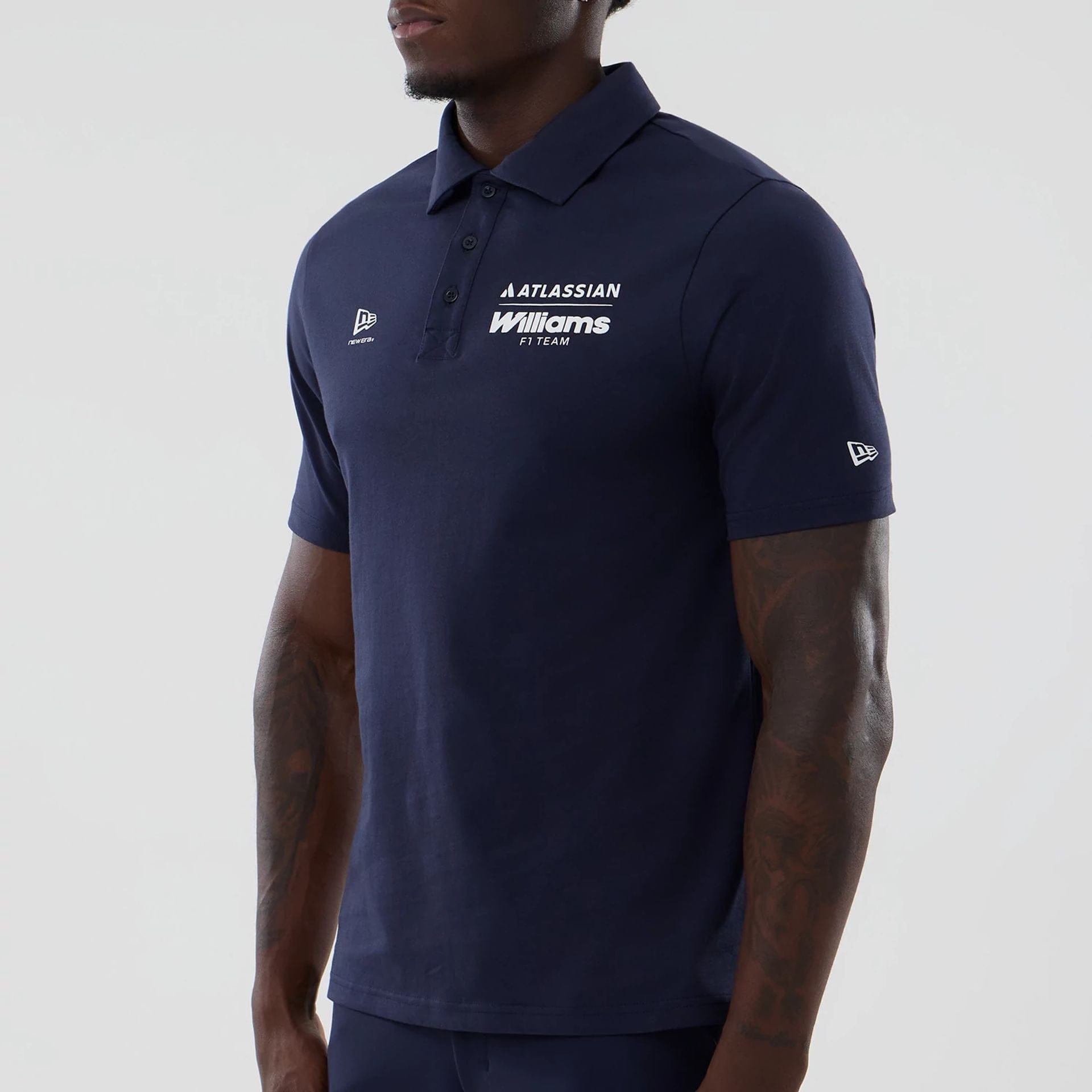 The model is wearing this Atlassian Williams F1 Team Polo T-Shirt in navy. 5