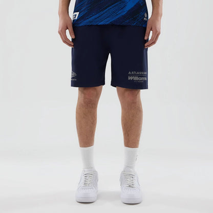 The model is wearing these Atlassian Williams F1 Team Training Shorts in navy. 1
