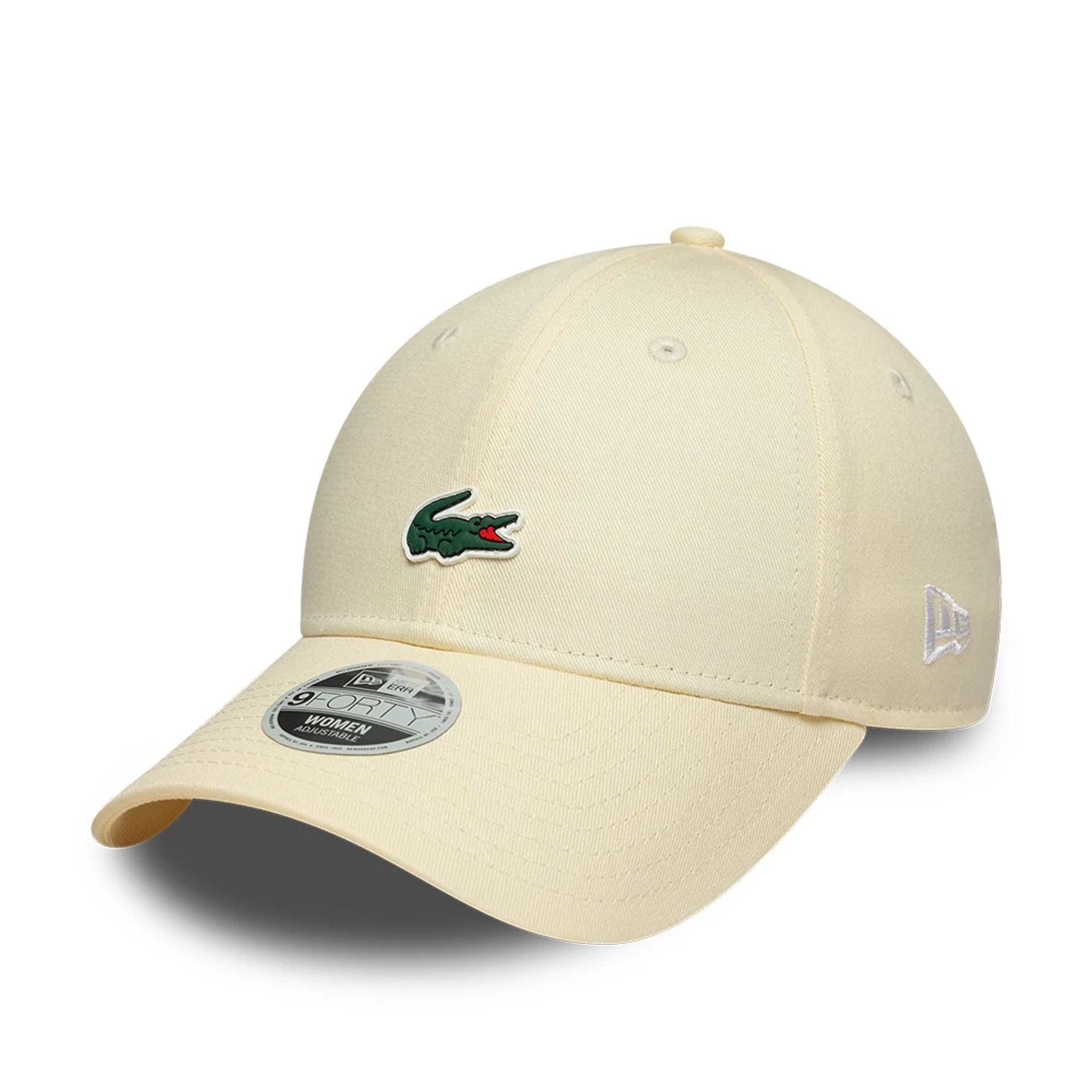 Pictured is this Womens Lacoste X New Era 9FORTY cap in light beige. 1