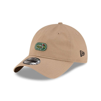 Pictured is this Lacoste X New Era Golf 9TWENTY cap in beige.  2