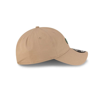 Pictured is this Lacoste X New Era Golf 9TWENTY cap in beige.  7