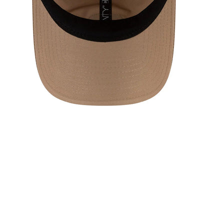 Pictured is this Lacoste X New Era Golf 9TWENTY cap in beige. 7