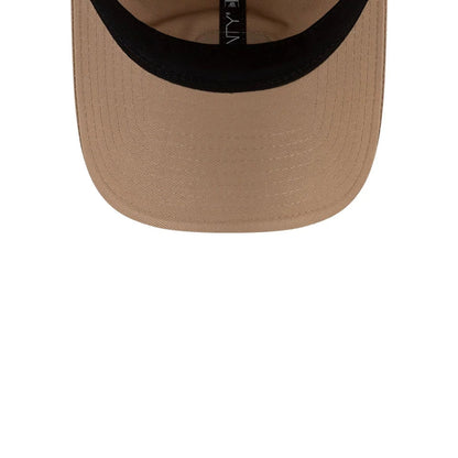 Pictured is this Lacoste X New Era Golf 9TWENTY cap in beige.  8
