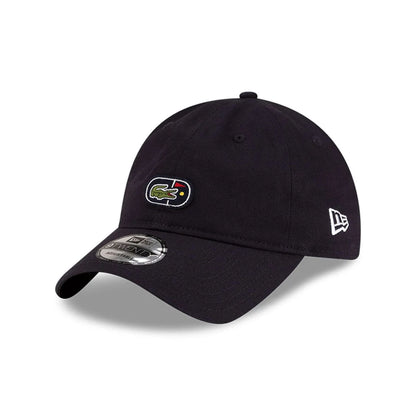 Pictured is this Lacoste X New Era Golf 9TWENTY cap in navy.  2