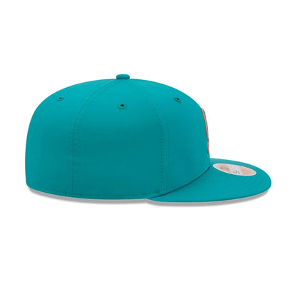 Pictured is this NFL Sideline 2026 Miami Dolphins 59FIFTY Fitted cap in turquoise. 7