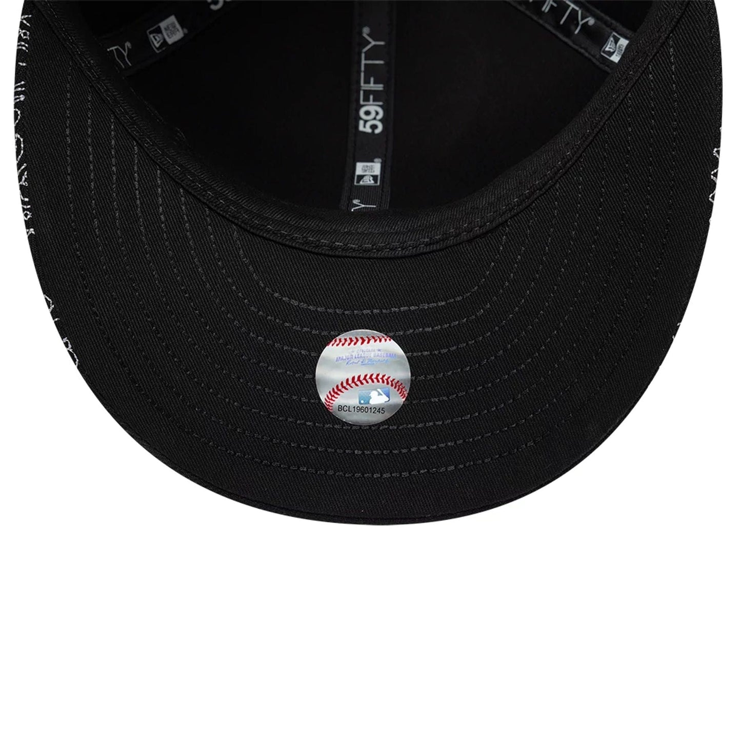 Pictured is this MLB All Over Paisley Chicago White Sox Low Profile 59FIFTY Fitted cap in black. 7