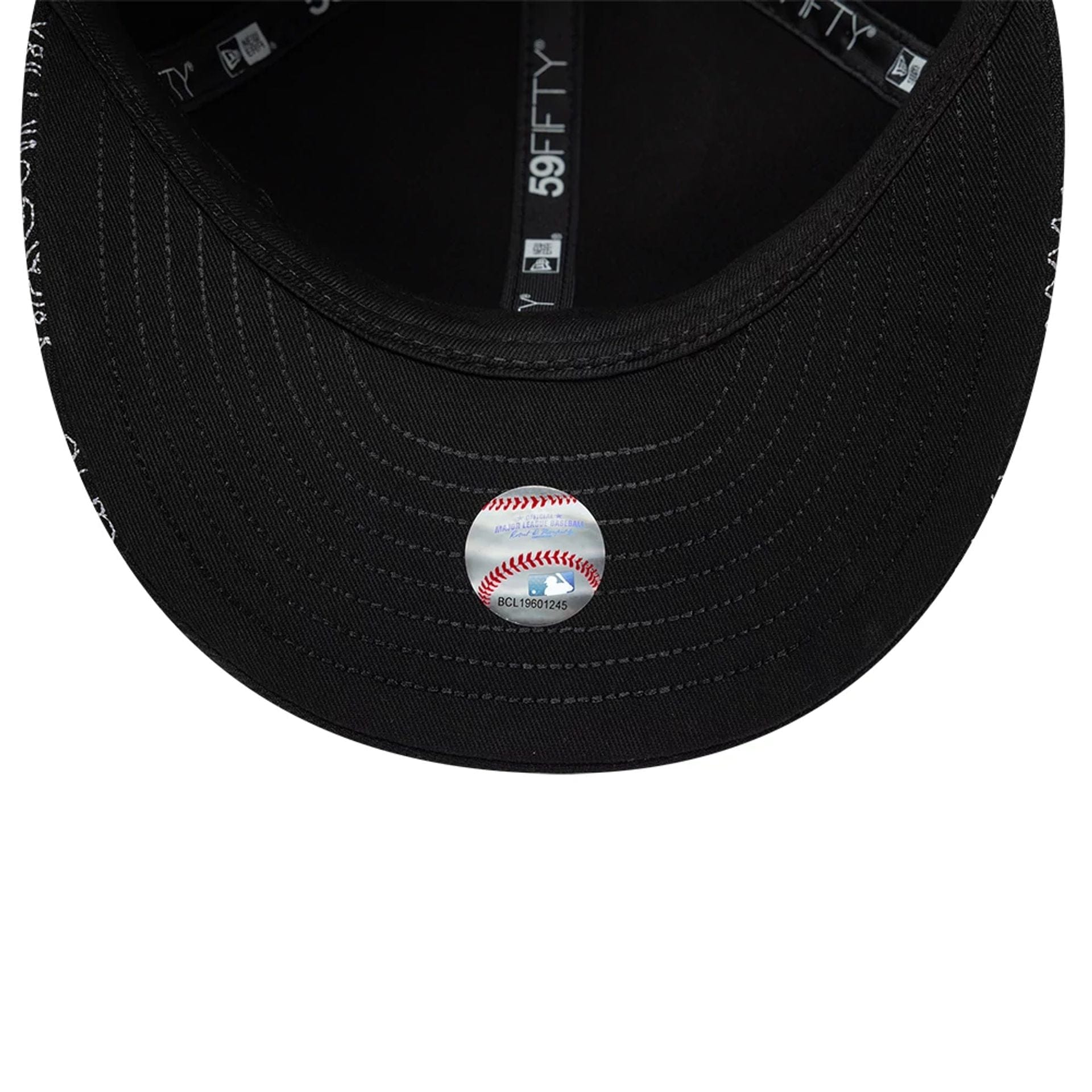 Pictured is this MLB All Over Paisley Chicago White Sox Low Profile 59FIFTY Fitted cap in black. 7