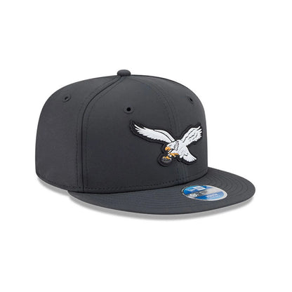 Pictured is this Youth NFL Sideline 2026 Philadelphia Eagles 9FIFTY Snapback cap in charcoal. 4