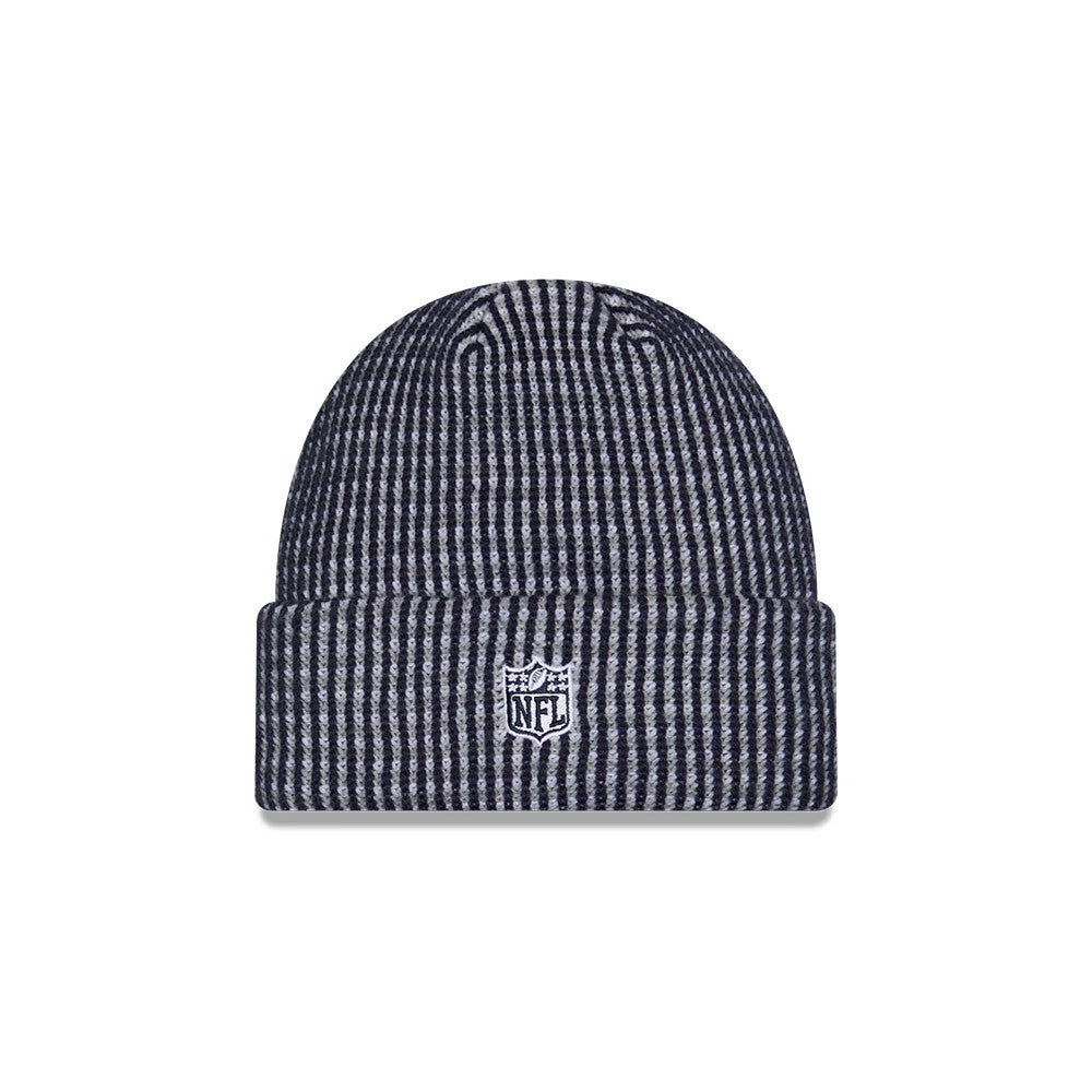 New Era Dallas Cowboys NFL Sideline 2026 Blue Cuff Knit Beanie Hat, front view showing the vertically ribbed knit pattern in alternating blue and grey tones, with an embroidered white NFL shield logo centred on the folded cuff.