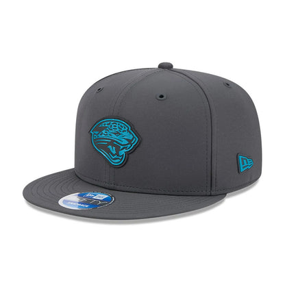 Pictured is this NFL Sideline 2026 Jacksonville Jaguars 9FIFTY Snapback cap in charcoal. 1