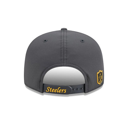 Steelers NFL Sideline 2026 Charcoal New Era 9FIFTY Snapback Adjustable Cap, rear view showing the embroidered Steelers wordmark on the adjustable snap closure, with a black and gold NFL shield logo on the left side of the structured charcoal crown.
